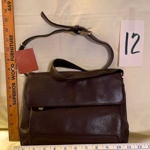 Brand new with tags Liz Claiborne leather handbag. 11” x 8” Cognac in color